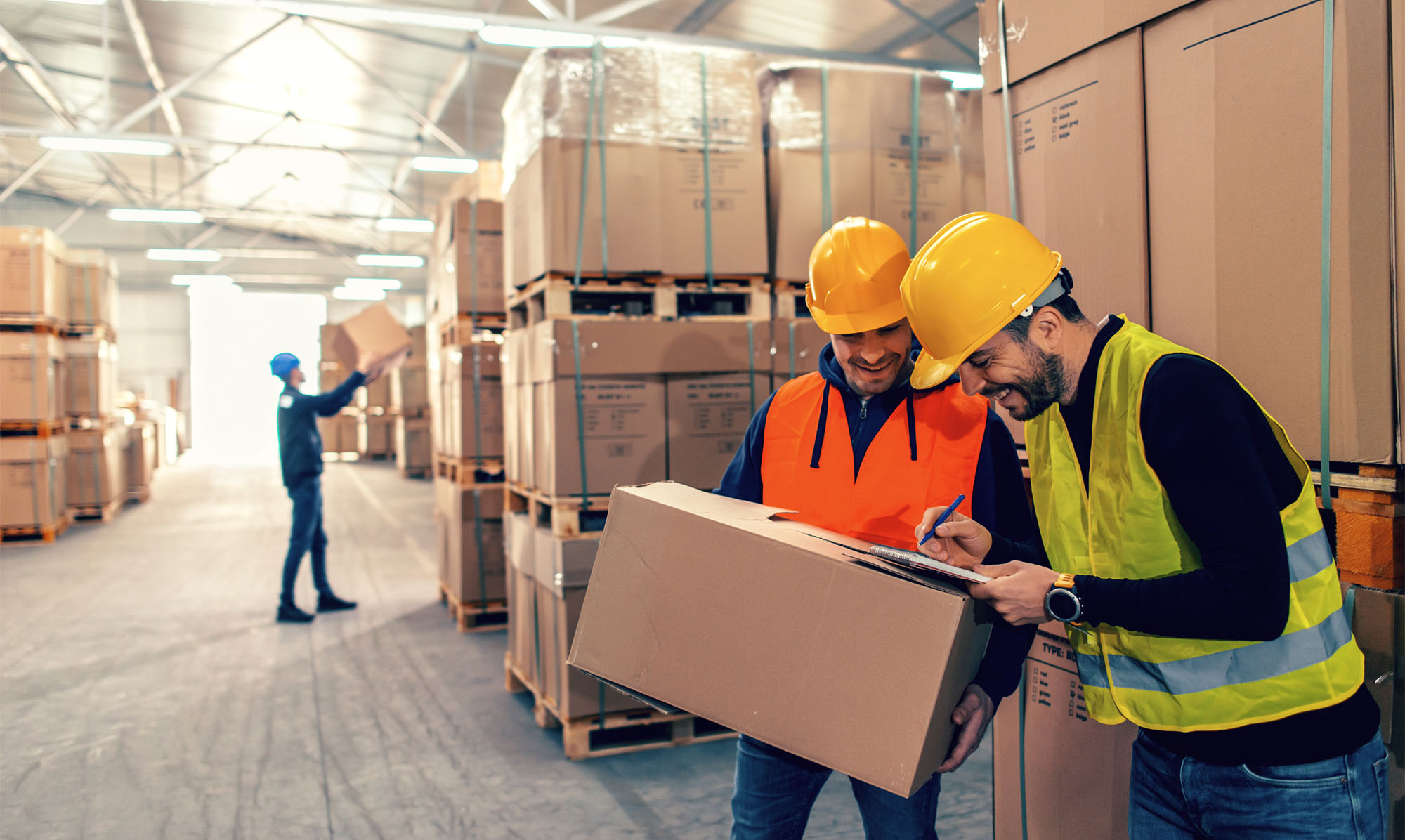Warehouse workers in conversation